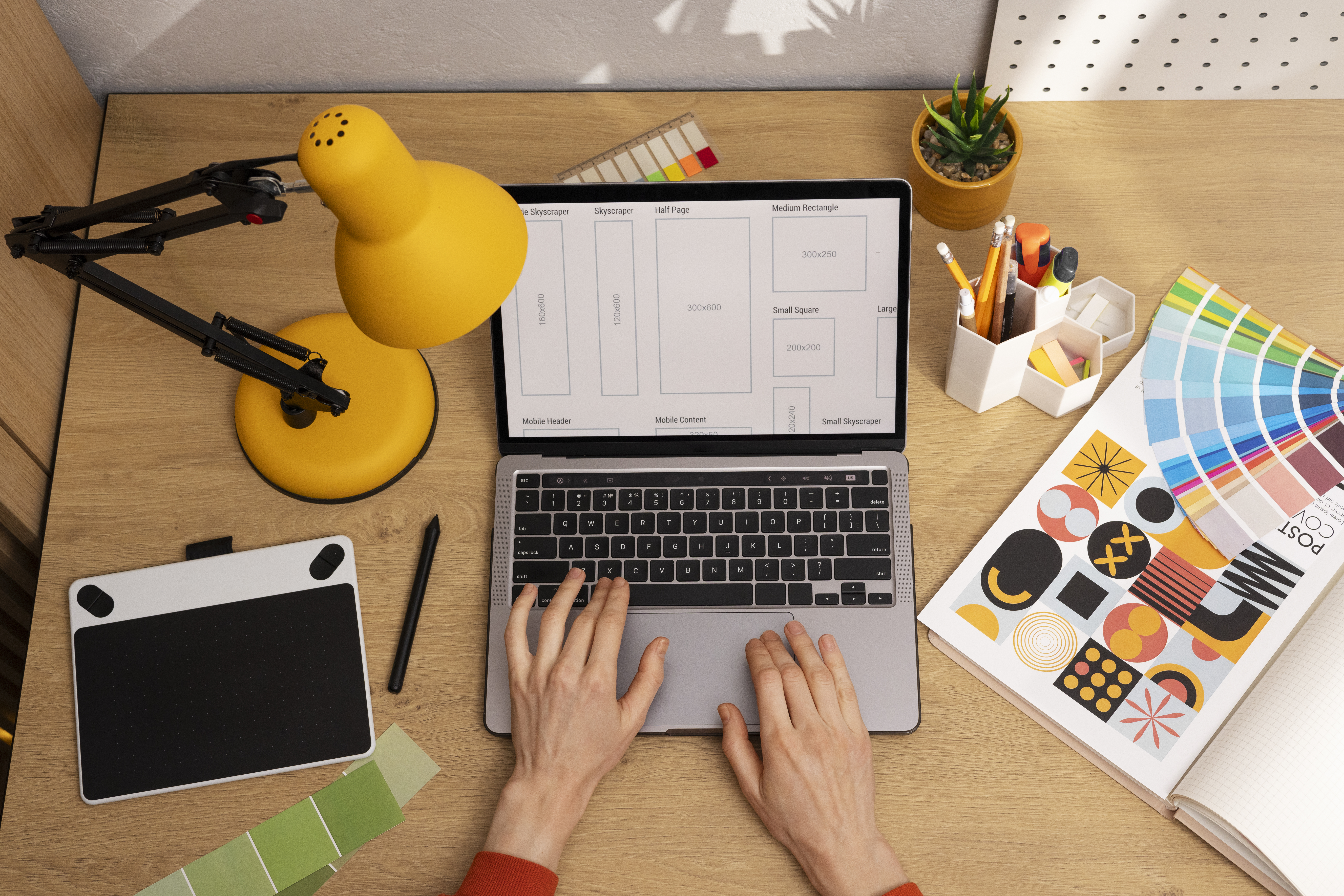 A still life of a graphic design studio, representing the story of Beyond Ads